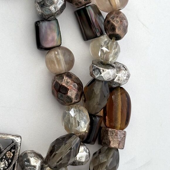 Multi-strand chains, rhinestones, brown and neutral-toned beads bracelet. - Picture 4 of 7